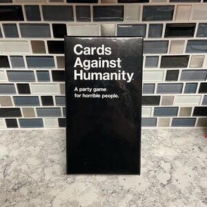 NEW “Cards Against Humanity” is "A party game for horrible people."